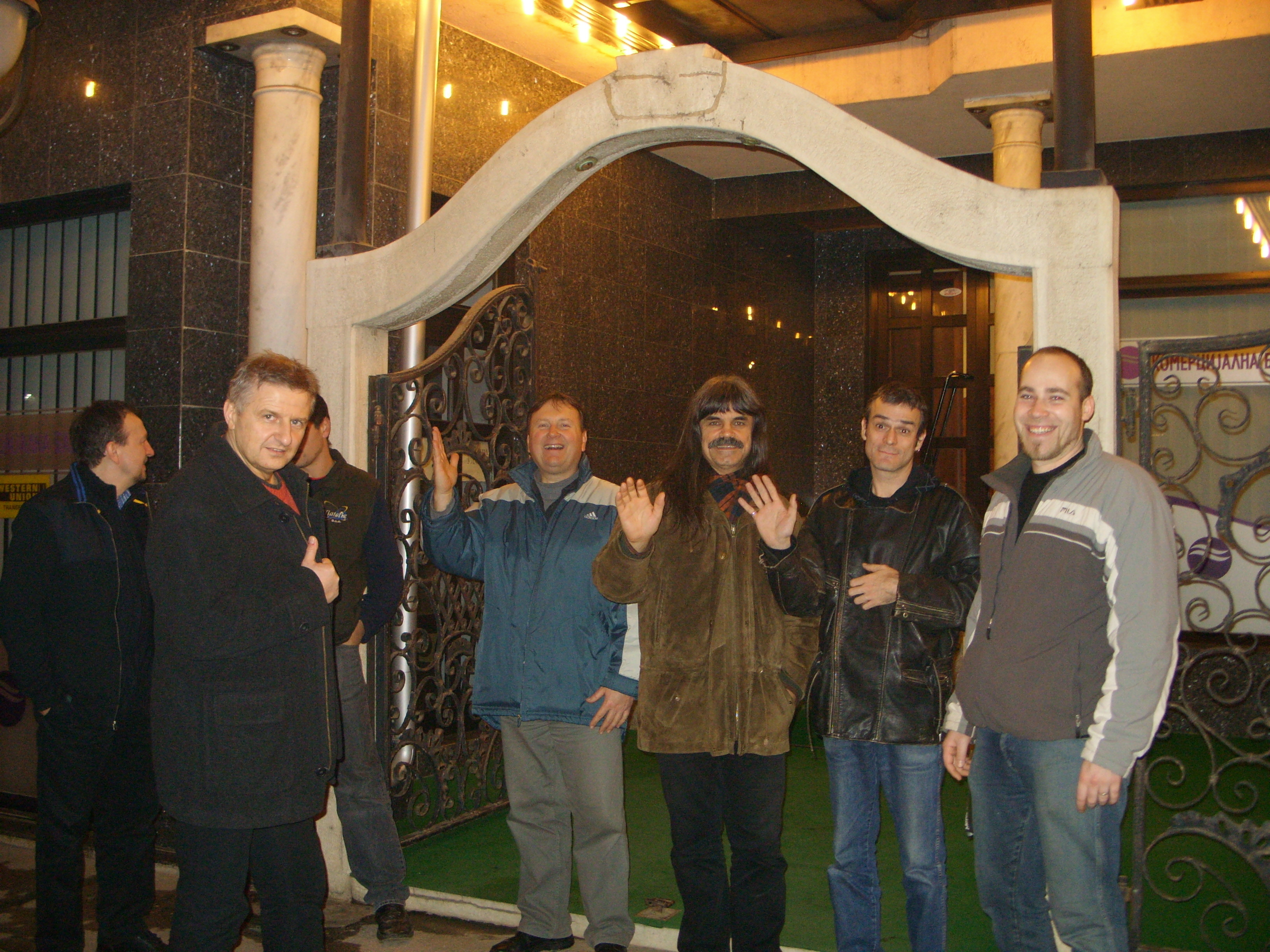 Group members with the staff in front of the Hotel